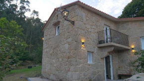 Casita a estrenar en finca con río próxima a Tui, Gondomar y Portugal.